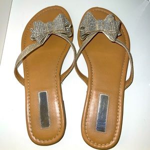 Glitter bow flip flops